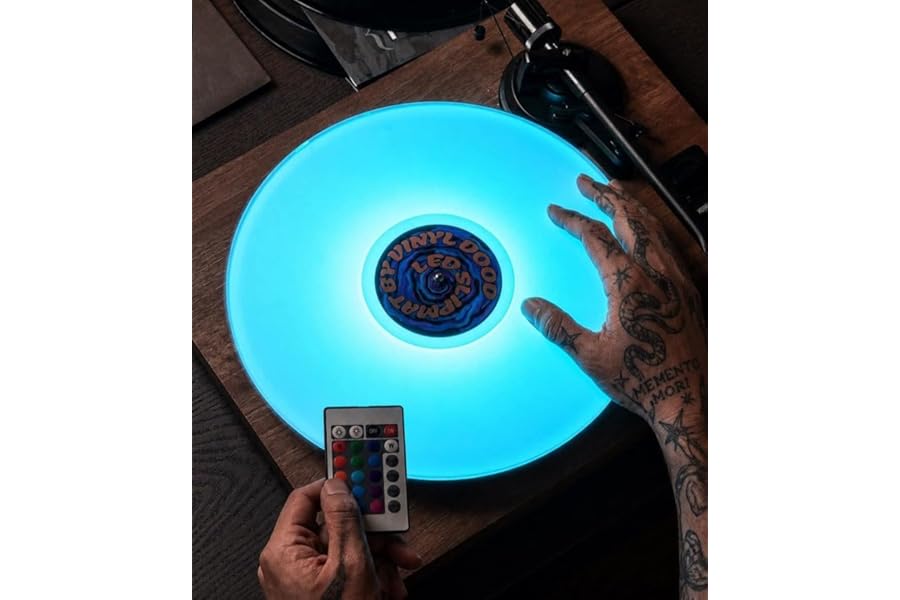 The World's first LED Slipmat for Turntables by Vinyl Dood™. PATENT PENDING. Acrylic, Dynamic LED Patterns, Multiple Colors, Fully portable, Rechargeable, Remote Included
