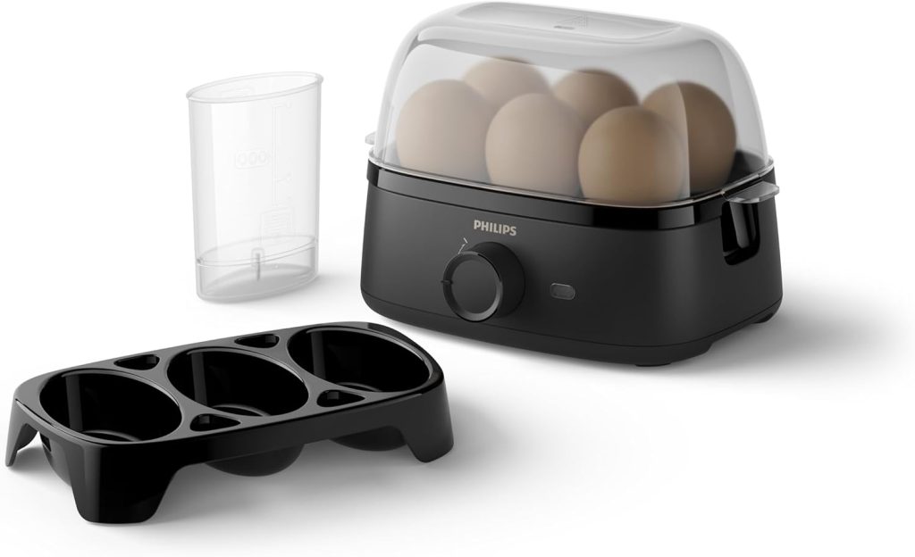 Philips 3000 Cuece Huevos Eléctrico, hasta 6 Unidades, 400 W | Cuecehuevos para hasta 6 huevos, blandos, medios o duros, bandeja para escalfar y perforador, 400 W, Negro (HD9137/90)